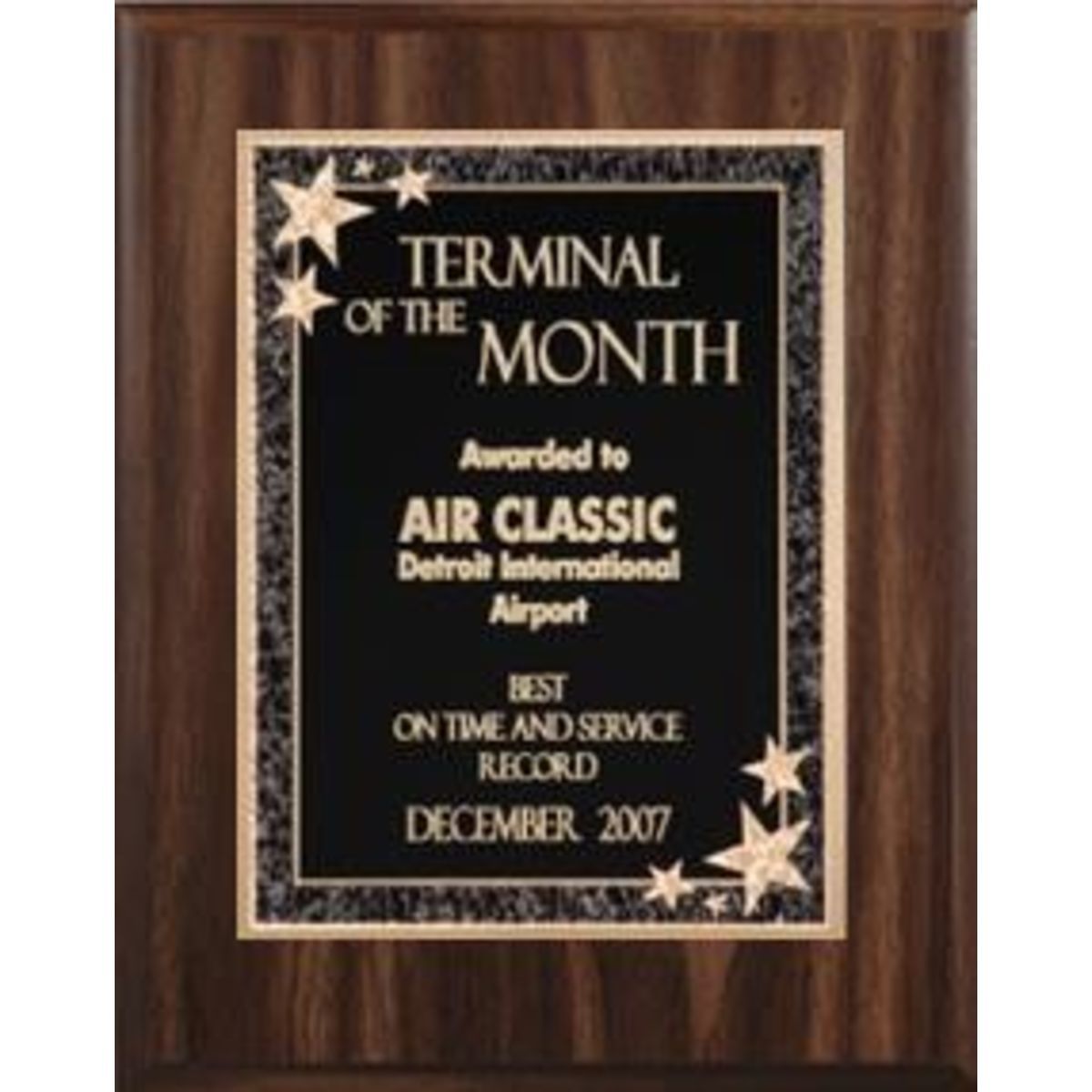 7" x 9" Walnut Finish Plaque with a Black Starburst Plate