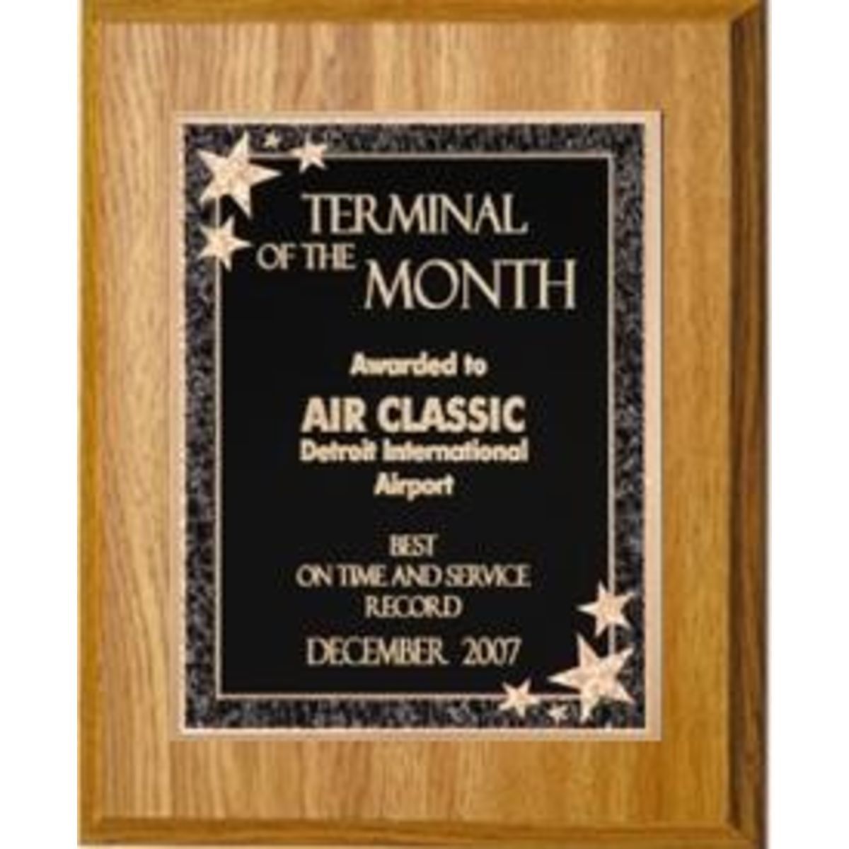 7" x 9" Oak Finish Plaque with a Black Starburst Plate