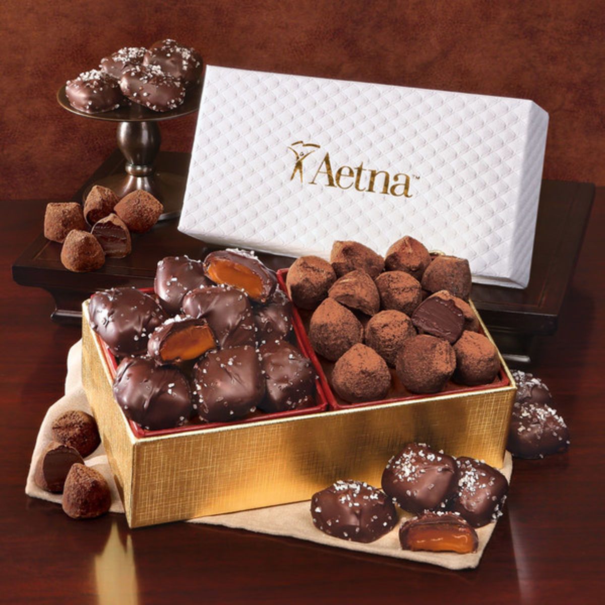 Promotional Chocolate sea salt caramels cocoa dusted truffles in pillow