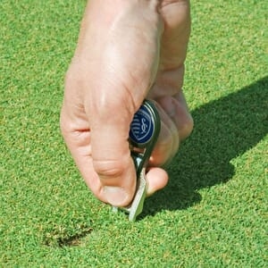NCAA - CVX BALL MARK REPAIR TOOL AND 2 BALL BALL MARKERS
