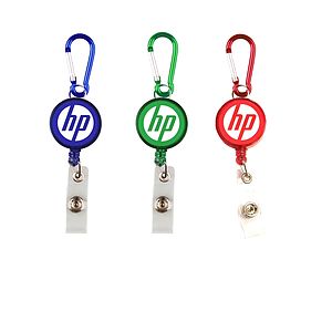 Round retractable badge holder with carabiner.