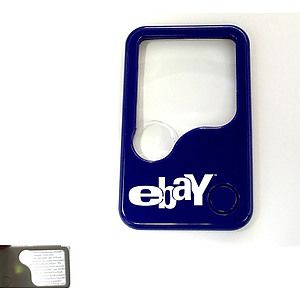 Credit card size magnifier with LED flashlight